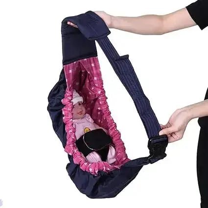 bebe dans echarpe de portage rose