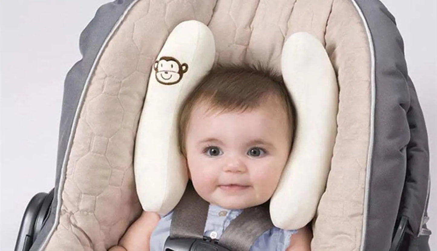 bebe dans la poussette avec cale tete pour bebe blanc