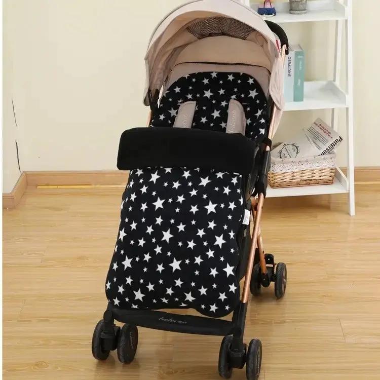 chanceliere bebe pour poussette noir au salon