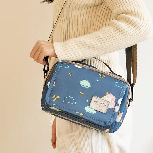 maman porte sac a langer avec tapis de change