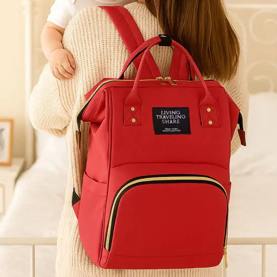 maman salon avec sac a dos langer rouge