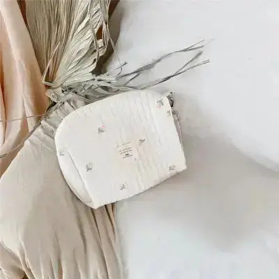 sac a langer bebe confort sur sofa