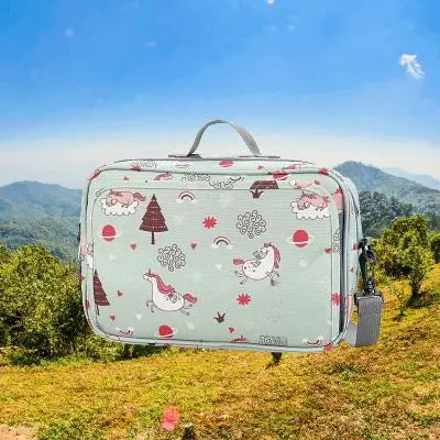 sac a langer pour poussette dans la nature