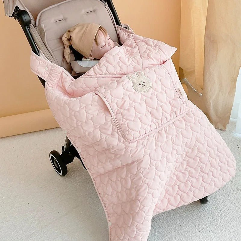 bebe dans cape porte bebe