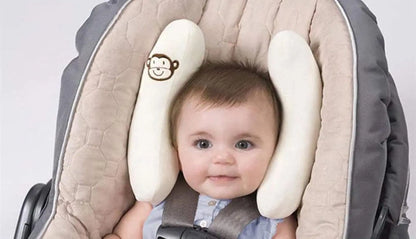 bebe dans la poussette avec cale tete pour bebe blanc