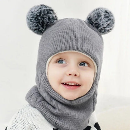 bonnet cagoule bebe gris avec ponpom
