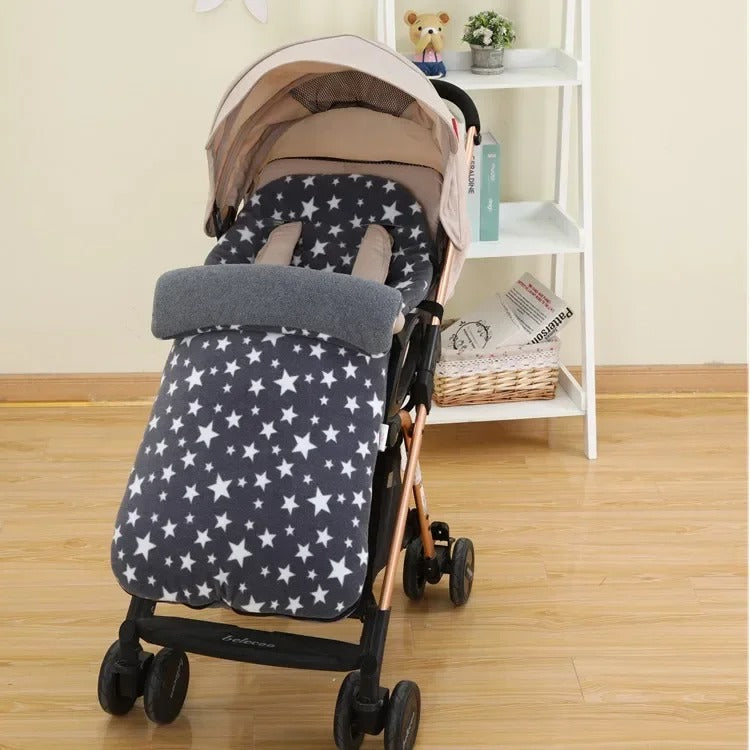 chanceliere bebe pour poussette gris au salon