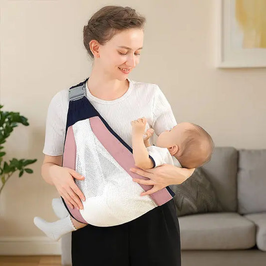 maman avec porte bebe sling rose