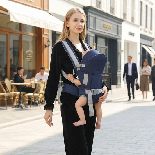 maman centre ville avec bebe dans porte bebe
