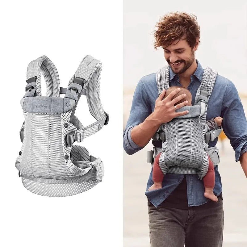 papa avec bébé dans porte bebe physio gris