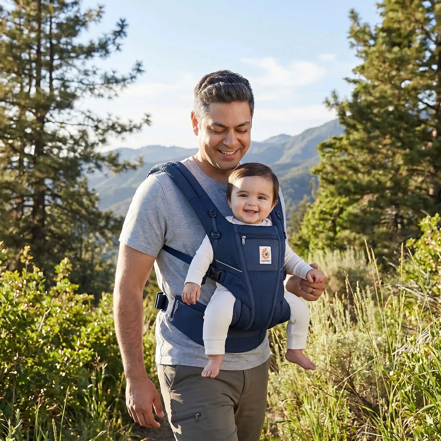 papa parc avec bebe porte bebe physiologique