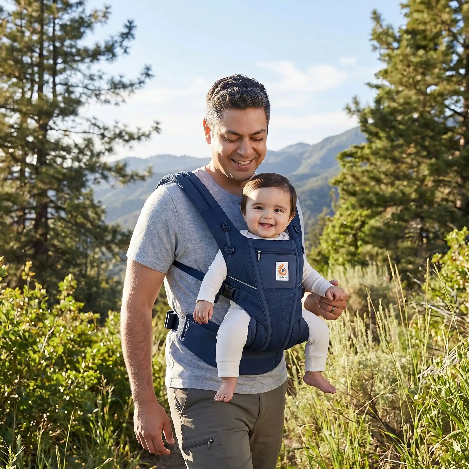 papa parc avec bebe porte bebe physiologique