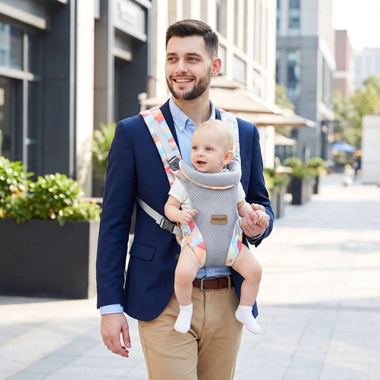 papa ville avec porte-bébé physiologique