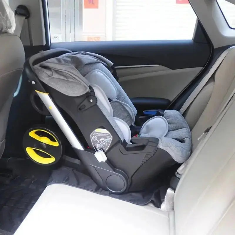 poussette bebe confort dans la voiture